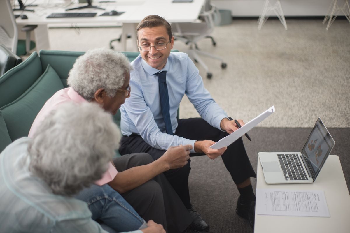 Financial advisors collaborating in a modern office